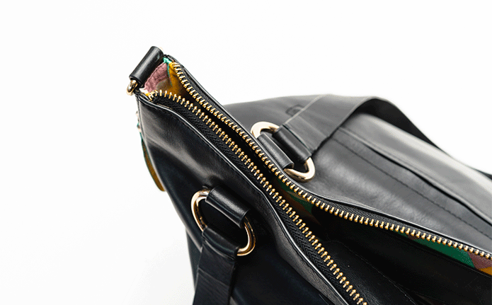 Creative designer turns luxury gift bags into wearable handbags using rope  and just a few screws